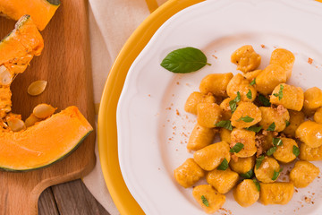 Pumpkin gnocchi with grated amaretti cookies.