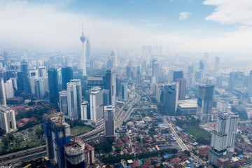 KUALA LUMPUR - Malaysia. November 12, 2019: Aerial view of KL tower in Kuala Lumpur CBD area shot at midday over blue sky