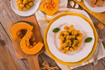 Pumpkin gnocchi with grated amaretti cookies.