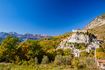 A view of the ancient village of Cerro al Volturno, surrounded by green woods and mountains. The...