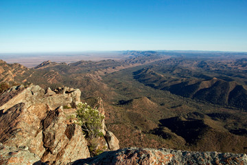 Twisted and folded ancient rocks of the Flinders Ranges, South Australia, viewed from the top of St Mary’s Peak on a sunny spring morning