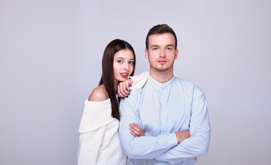 Beautiful young couple on the background.