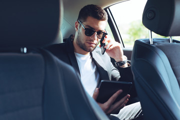 Businessman Talking Using Phone Car Inside - obrazy, fototapety, plakaty