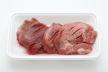  Image of thick sliced ​​beef tongue on white background