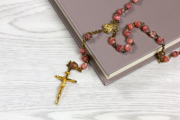 Rosary Lying on a Book