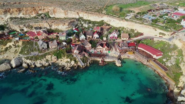 Aerial view of Popeye Village. Sunny day, blue sea, blue sky. Mellieha city. Malta island