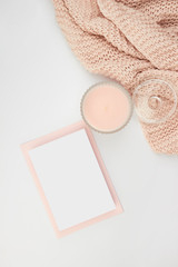 flatlay rose pastel pink peach candle paper sheet card invitation envelope wool blanked plaid cozy female wedding baby shower
