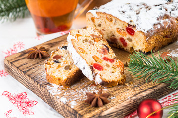 Stollen traditional Christmas ftuitcake with dried fruit and nut
