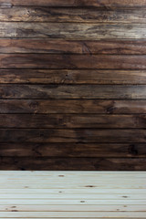 Fototapeta premium wooden wall with tabletop, background, place for text, place for placing goods