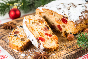 Stollen traditional Christmas ftuitcake with dried fruit and nut