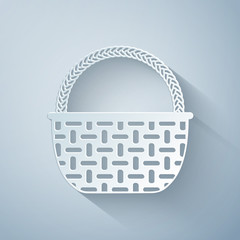 Paper cut Shopping basket icon isolated on grey background. Online buying concept. Delivery service sign. Shopping cart symbol. Paper art style. Vector Illustration
