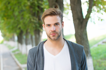 clean groomed look. Handsome caucasian man walk in park. Bearded guy casual style. trimming and...