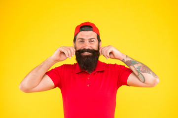 male summer fashion. Barber salon and facial hair care. being trendy and brutal. Beard and mustache grooming. happy mature hipster yellow background. brutal man with beard. mustache grooming guide