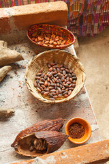 Cocoa Beans In The Basket And Cocoa Power On The Brick Table, Top View.