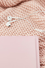 Headphones on knitting wool ceiling blanket rose peach pink pastel notebook planner cozy planner 
