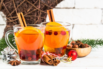 Winter hot tea with orange, cranberry and spices.