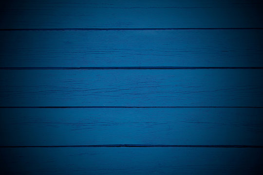 Old painted blue wooden boards. Horizontal view. Close-up. Background. Texture.