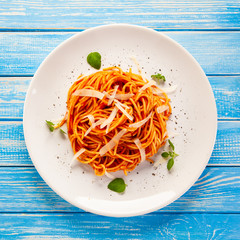Pasta with pesto, cheese and basil