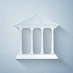 Paper cut Bank building icon isolated on grey background. Paper art style. Vector Illustration