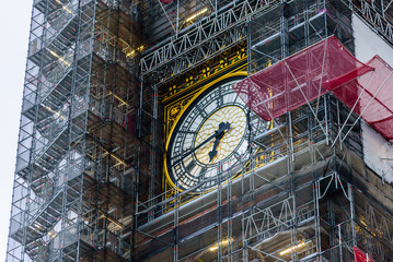 Big Ben watch in maintenance covered by metal structures