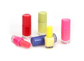 Nail polishes bottles isolated on white background