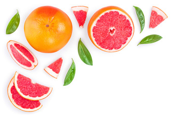 Grapefruit and slices with leaves isolated on white background with copy space for your text. Top view. Flat lay pattern