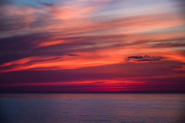 Naklejka na ściany i meble Red sunset on the beach in Saulkrasti. 