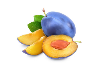 fresh blue plum and half with leaves isolated on white background