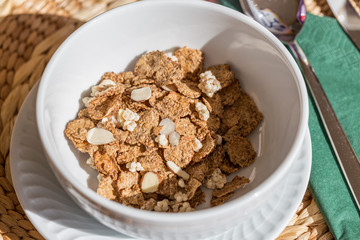 Healthy cereal breakfast outside. Close up in table
