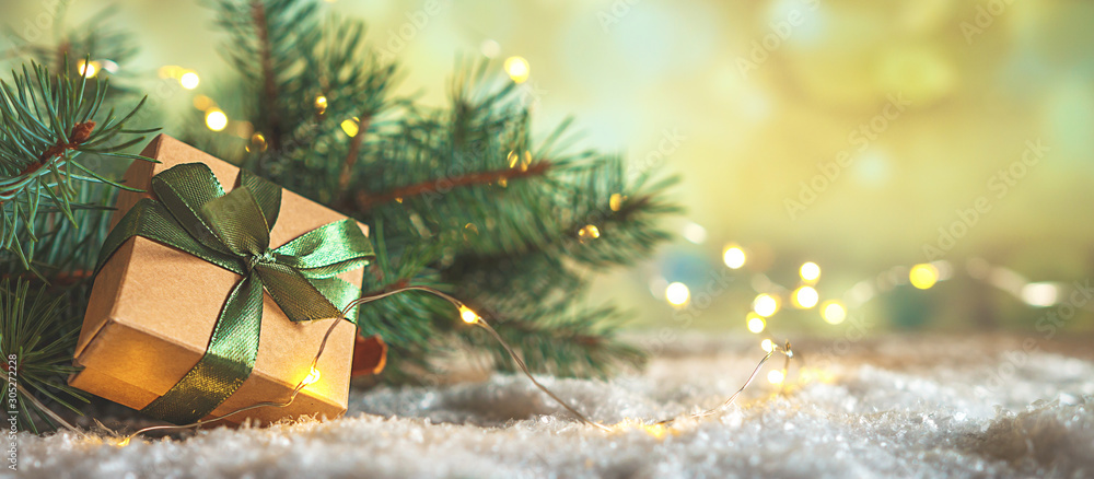 Wall mural christmas and zero waste, eco friendly packaging gifts in kraft paper on a wooden table, eco christm