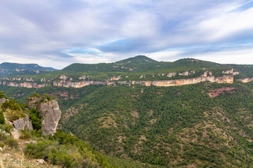Fototapeta na wymiar The cloudy sky over the valley of Priorat and Montsant in Catalonia, the view from Siurana village