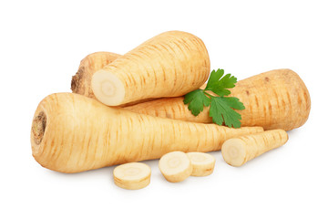 Parsnip root and slices with parsley isolated on white background closeup