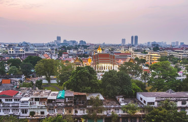 Fototapeta premium View to buildings and roofs of Bangkok city, Thailand