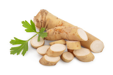 Horseradish root with slices and parsley isolated on white background