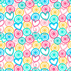 Seamless vector pattern with circles, hearts and swirls in a cute color palette.