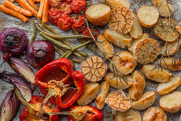 oven-baked vegetables with spices olive oil and fragrant grassmin