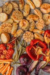 oven-baked vegetables with spices olive oil and fragrant grassmin