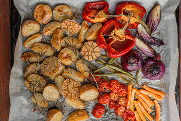 oven-baked vegetables with spices olive oil and fragrant grassmin