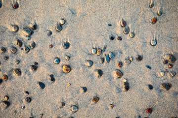 stones on the beach and on the sand