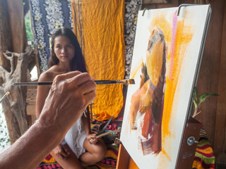 Thai girl as a friend of Paul Gauguin posing for an artist in Thailand - 305278842