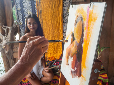 Thai girl as a friend of Paul Gauguin posing for an artist in Thailand