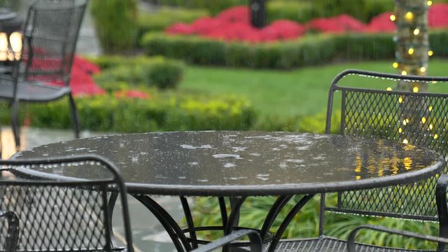 Rain slow motion on top of table outside