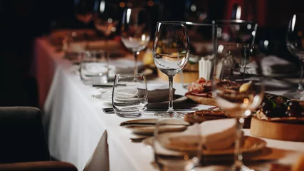 Deurstickers luxury tableware beautiful table setting in restaurant © loki_ast