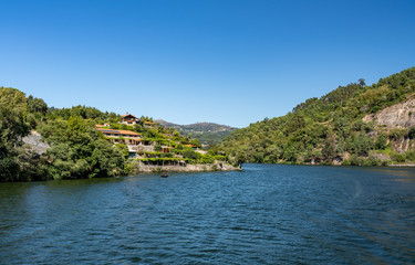Fototapeta na wymiar Vacation or holiday home on the banks of river Douro in Portugal