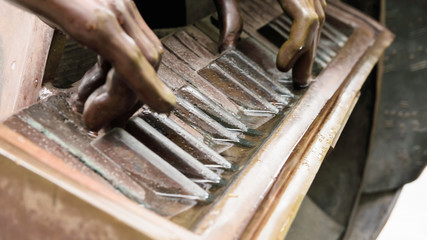 creativity concept, close-up, musician's fingers playing piano keys