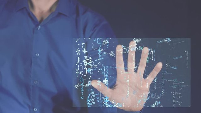 Futuristic technology for digital learning and finding the answer to a question. A man touches the screen on which the electronic book appears. Starting the system with a data archive