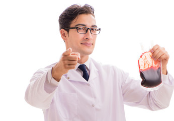 Doctor in blood donation concept isolated on white