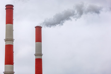 Steam from a pipe against the sky