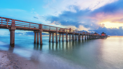 Fototapeta na wymiar Pier Naples, Florida - old bridge Florida. Travel concept.