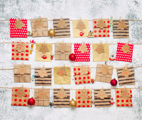 Christmas handmade advent 24-days calendar on the gray background